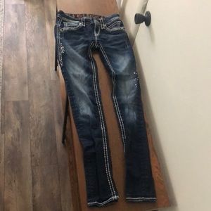 Size 25 gently used rock revival skinny
